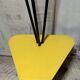 Mid-century tripod floor lamp with 3 lights and a yellow shelf.