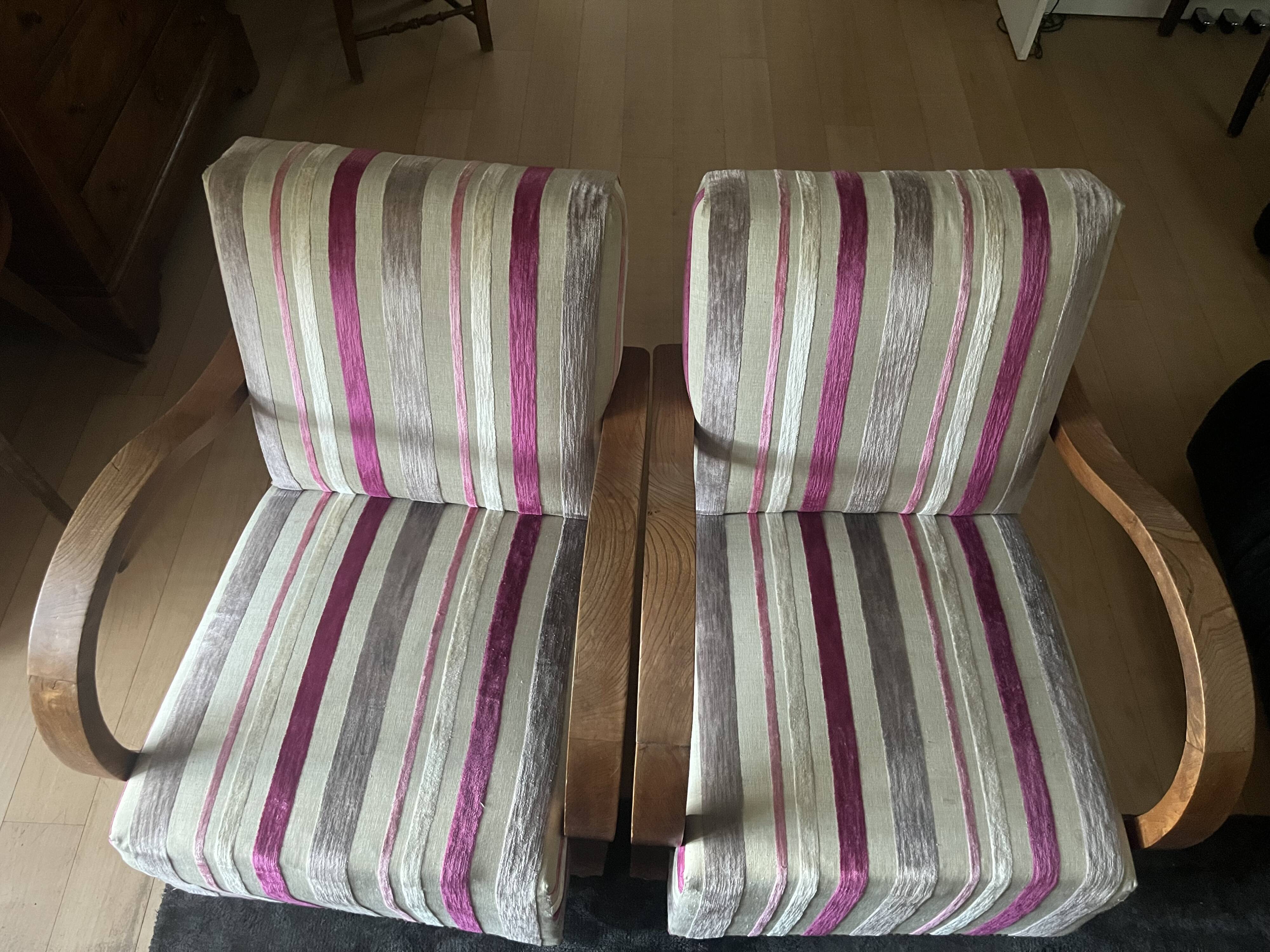 A pair of Art Deco armchairs in very good condition.