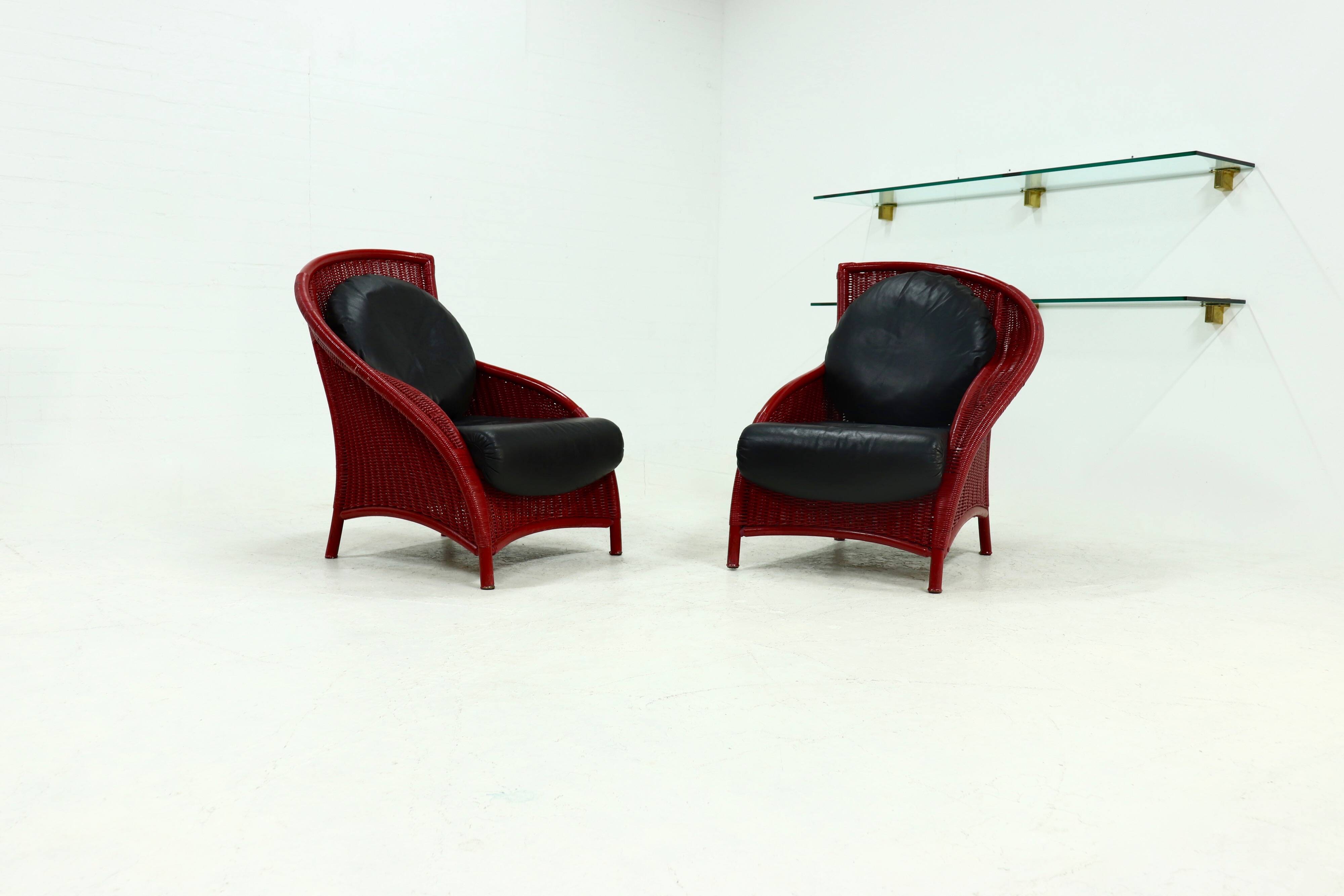 Set of 2 Sculptural Lounge Chairs in Red Lacquered Rattan 1970s