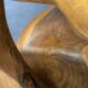 Stool n2 in solid raw walnut wood carved from the mass 1970
