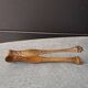 Antique sugar tongs with a system - Lion claws and Louis XV bow decoration.