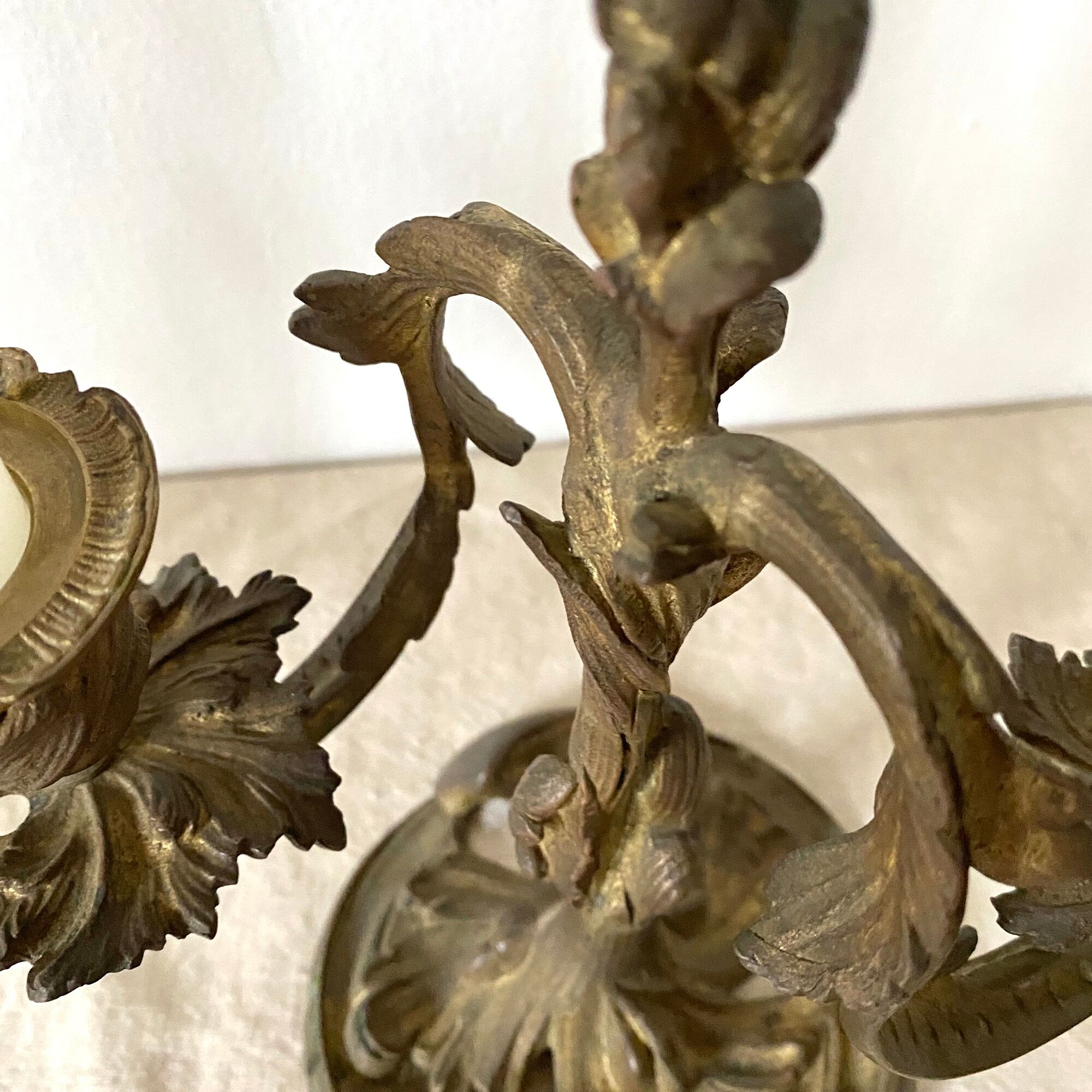 Pair of antique bronze candlesticks at the end of the table XIXth