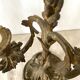 Pair of antique bronze candlesticks at the end of the table XIXth