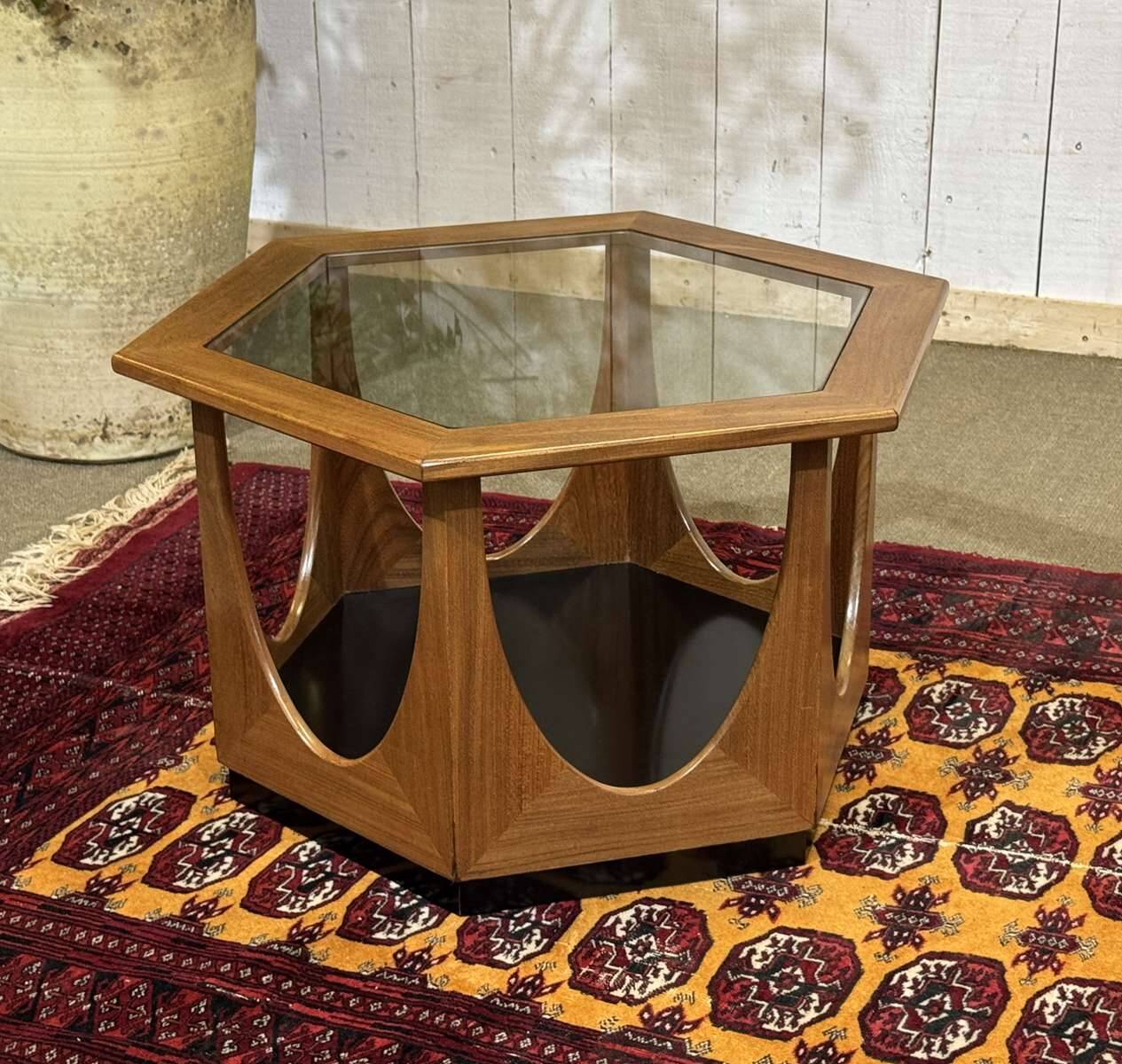1970s octagonal GPlan gueridon in teak with a glass top.