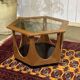 1970s octagonal GPlan gueridon in teak with a glass top.