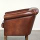Sheepskin club armchair in English style with brown colour scheme