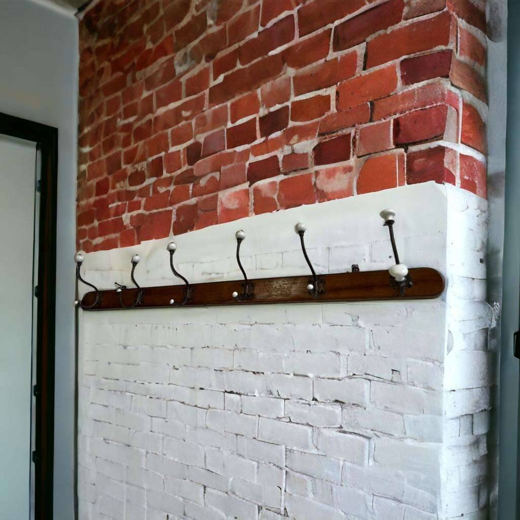 Vintage industrial wooden coat rack with porcelain hooks