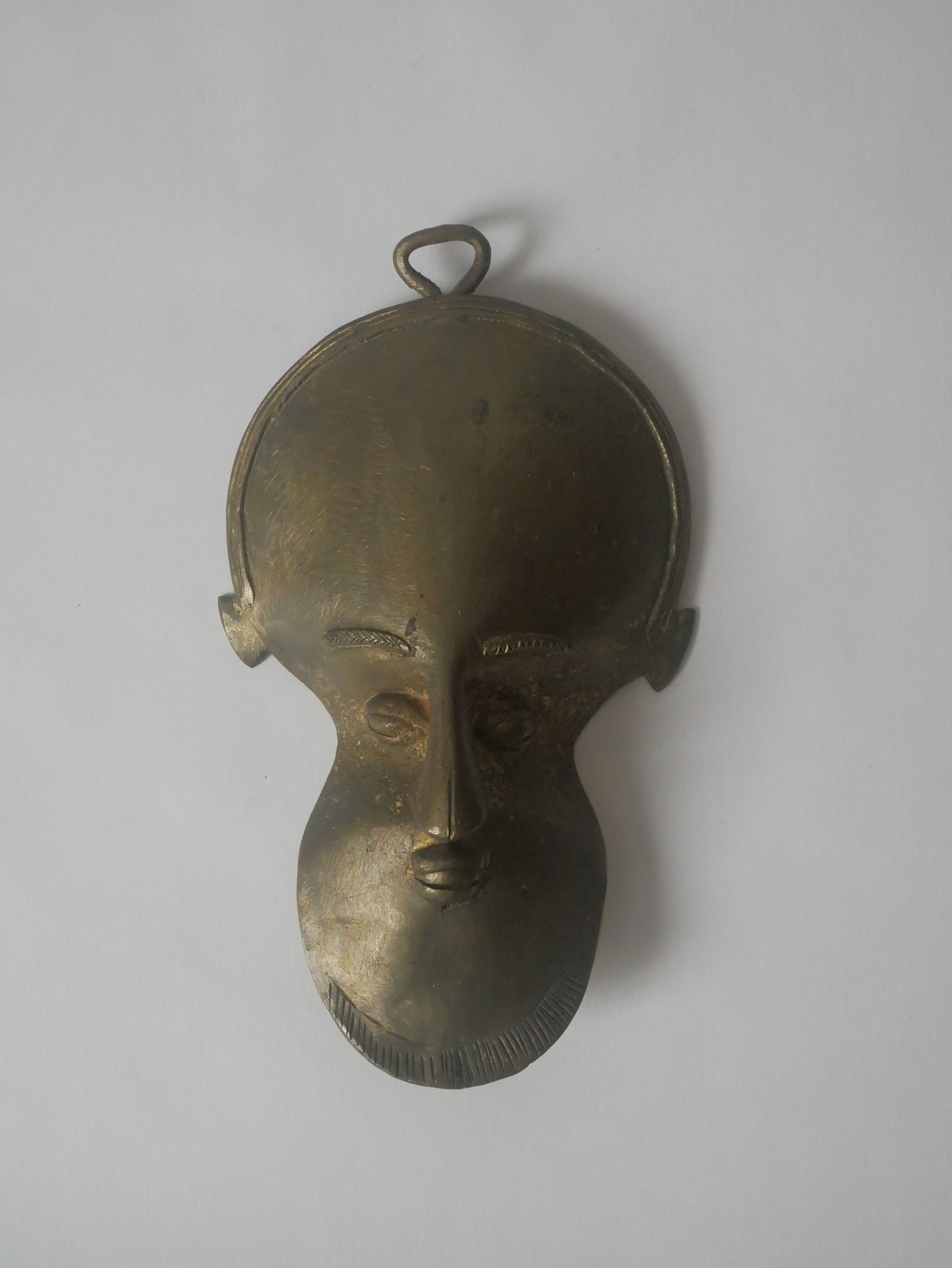 Brass mask wall sculpture tribal decorative object African art handmade vintage