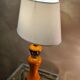 Lampe  en ceramique argent et orange vernisé
