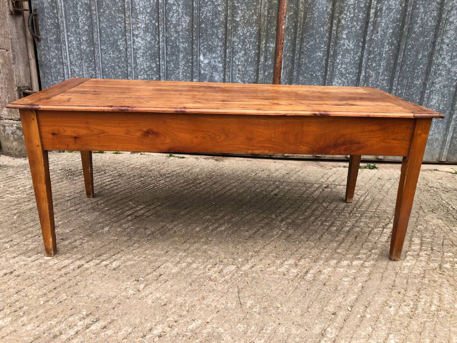 Antique cherry farmhouse table with 2 drawers and 1 pull-out