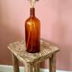 Amber glass bottle vase