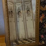 Large antique mirror in wood and gilded stucco, 19th century