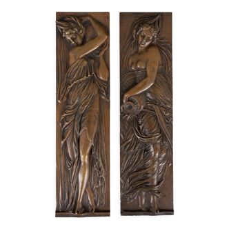 Pair of bronze plates women in antique after jean goujon les naïades