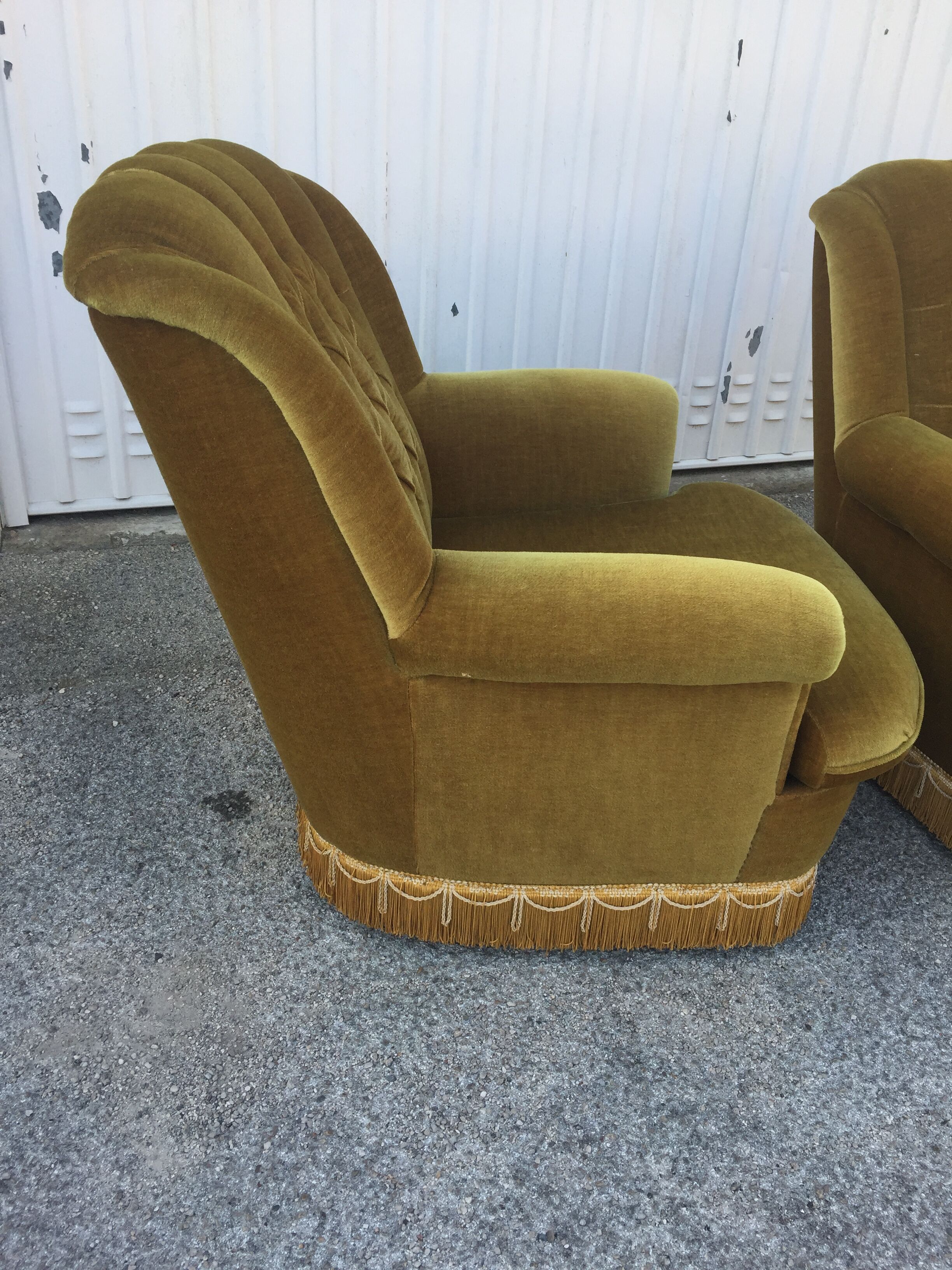 Pair of upholstered velvet armchairs