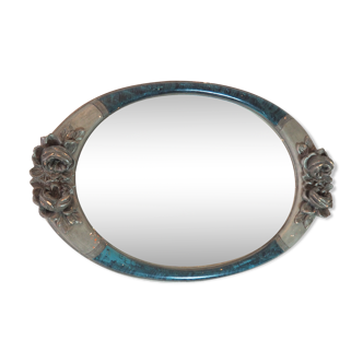 Mirror with rose relief decor