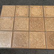 Vintage garden table with ceramic tile top and wrought iron base
