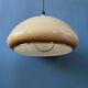 Beige acrylic glass mushroom pendant with a chrome top cap.