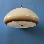 Beige acrylic glass mushroom pendant with a chrome top cap.