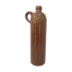 Old bottle in sandstone glossy with cove