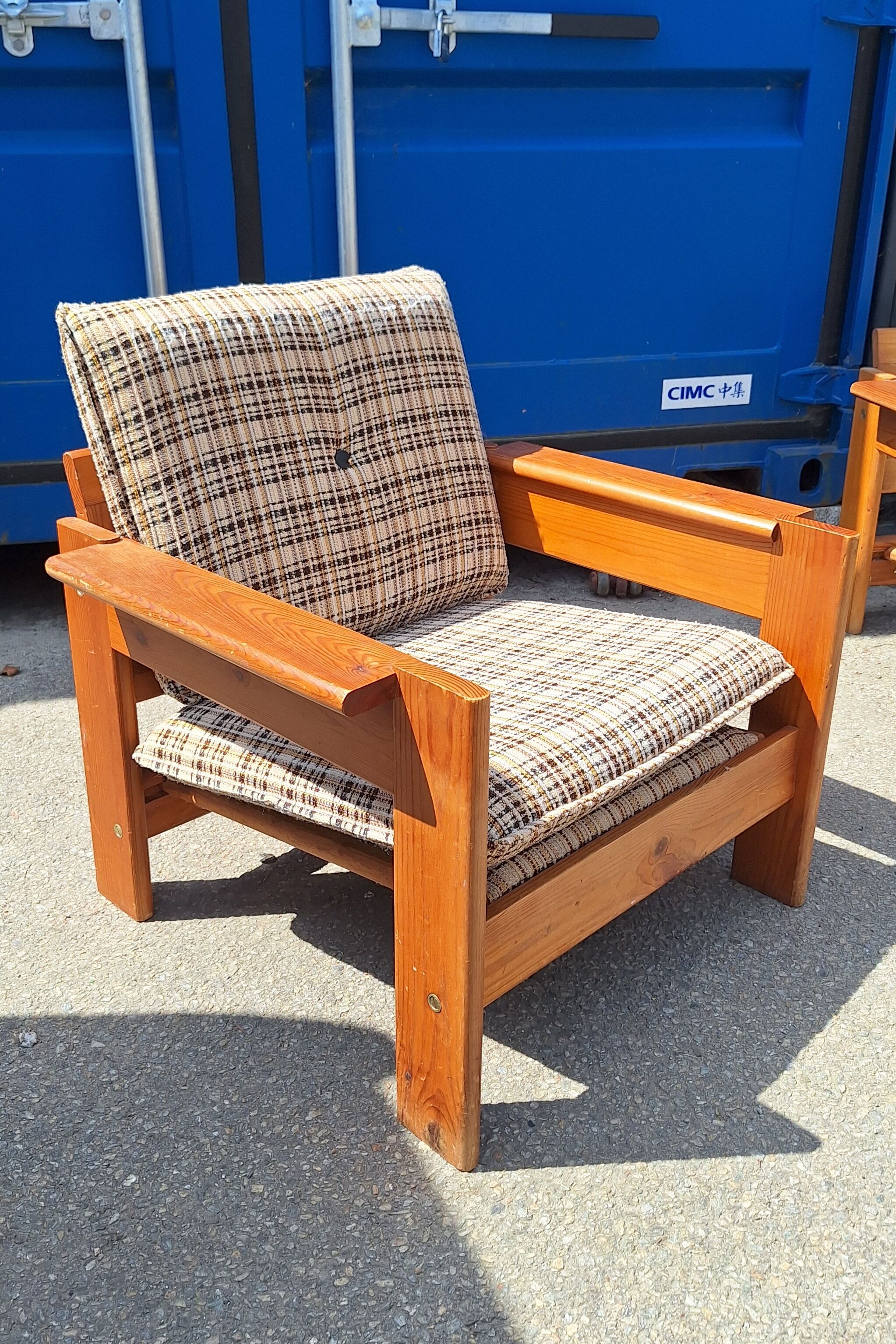 Brutalist-style bench and armchairs in 1970s pine.