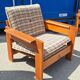 Brutalist-style bench and armchairs in 1970s pine.