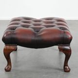 Dark brown chesterfield ottoman in cowhide leather