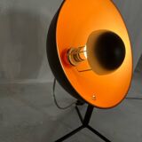 Vintage industrial lamp with a metal frame.