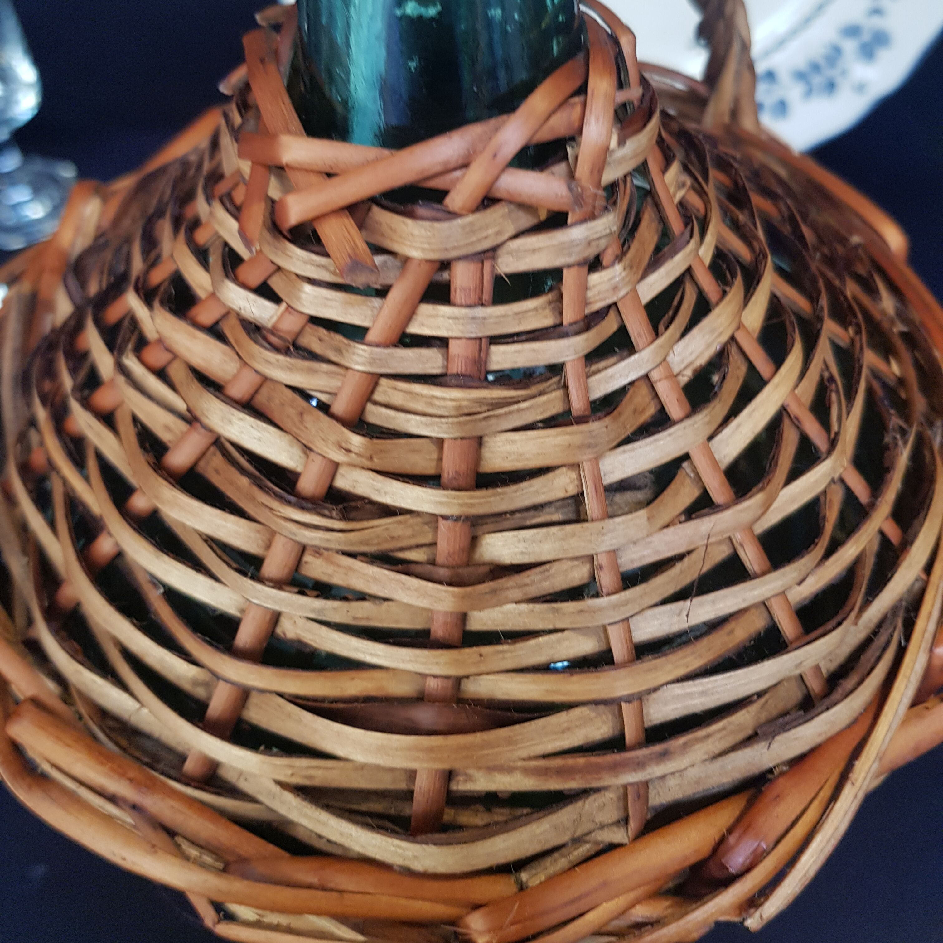 glass and rattan bottle