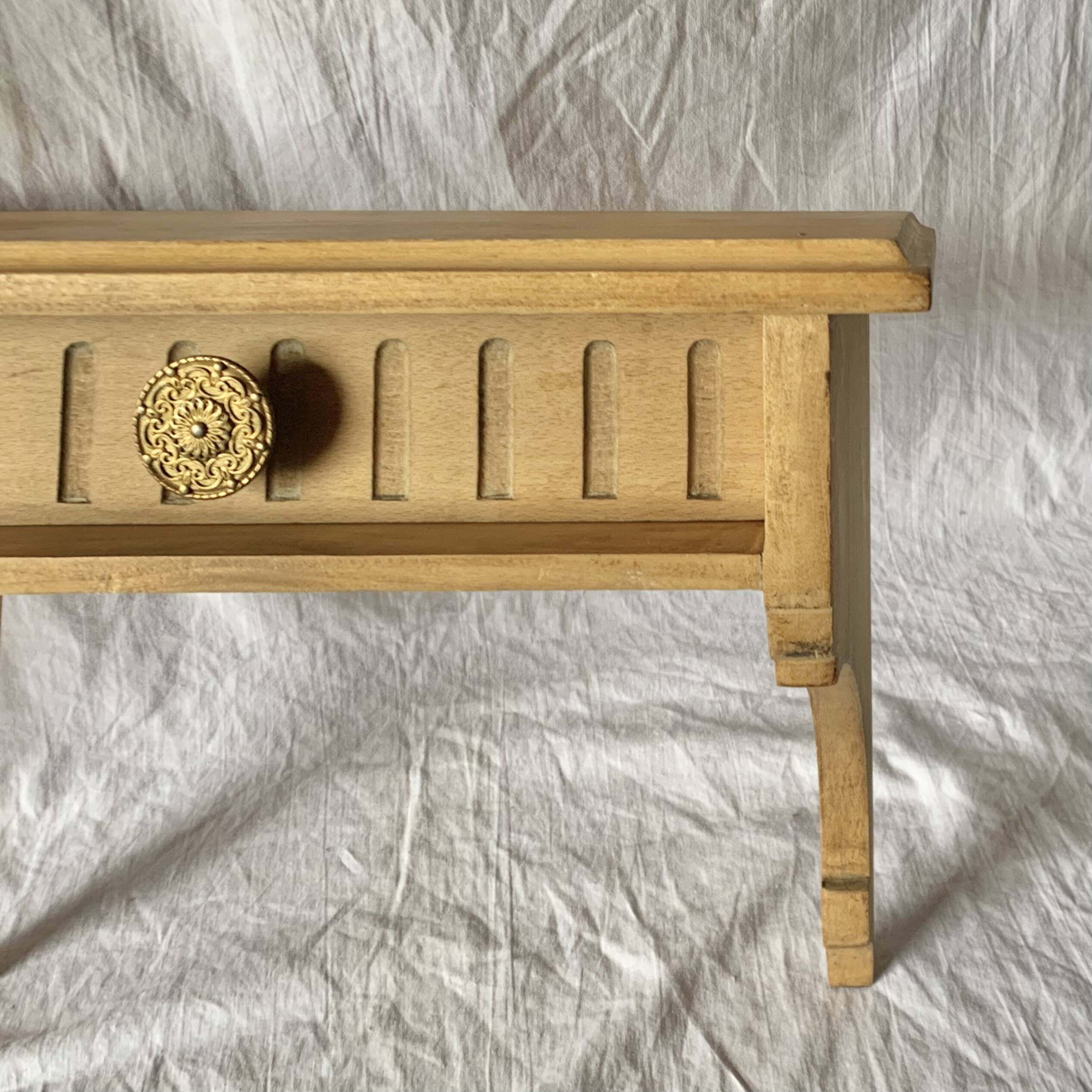 Old small hanging shelf in solid wood