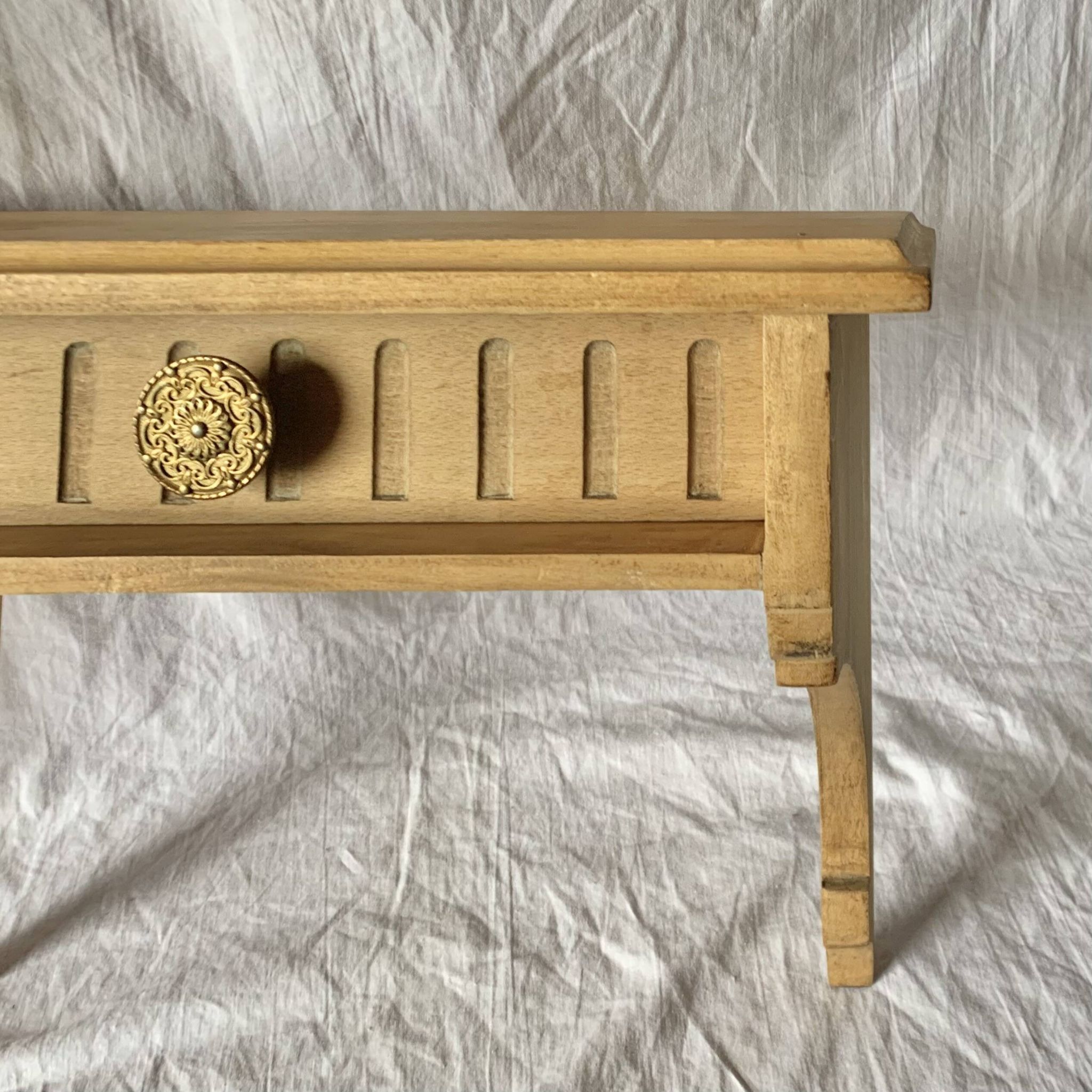 Old small hanging shelf in solid wood