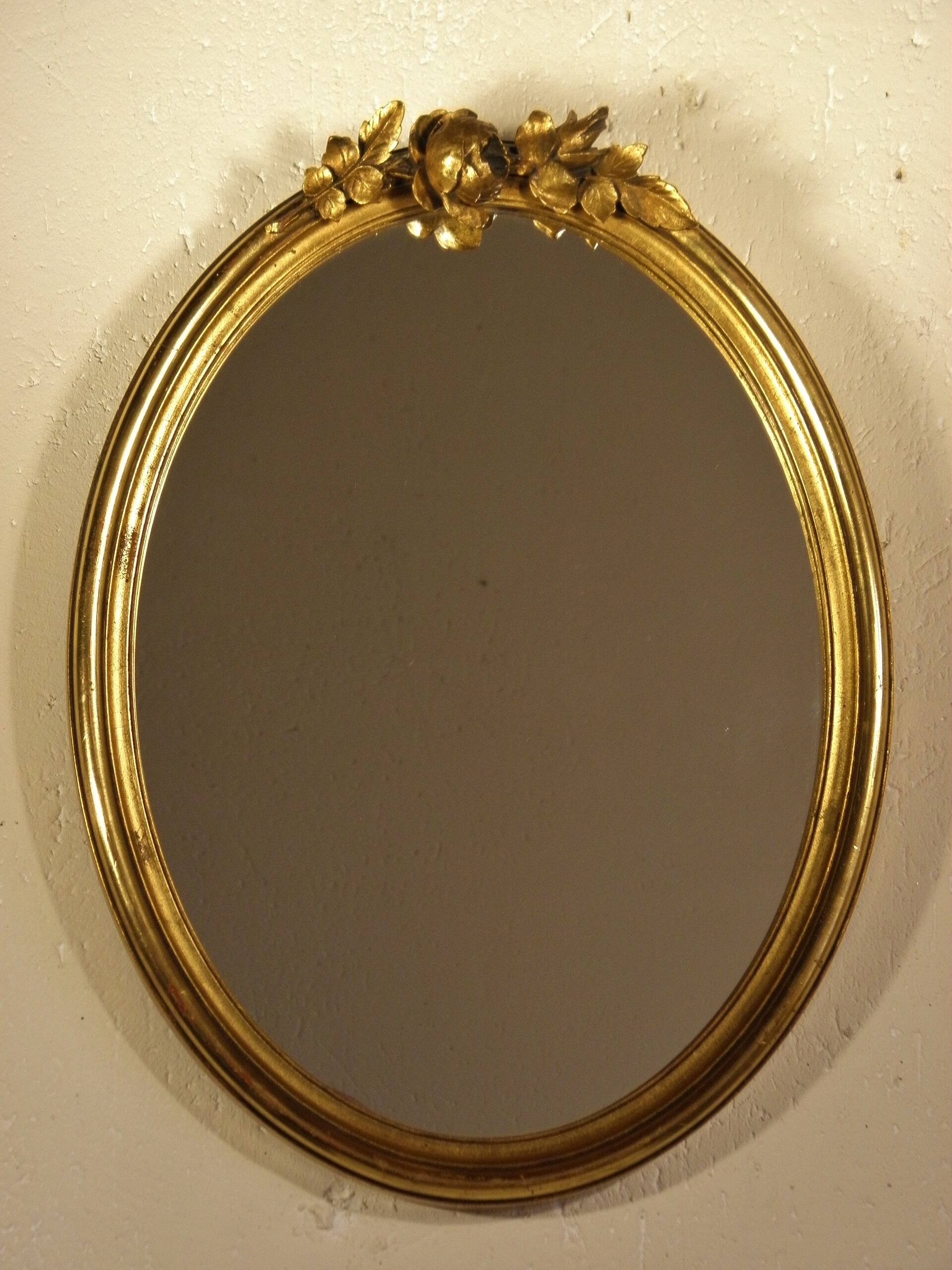 Oval gilded wood mirror 45 x 34