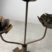 Rose shaped metal candle holder