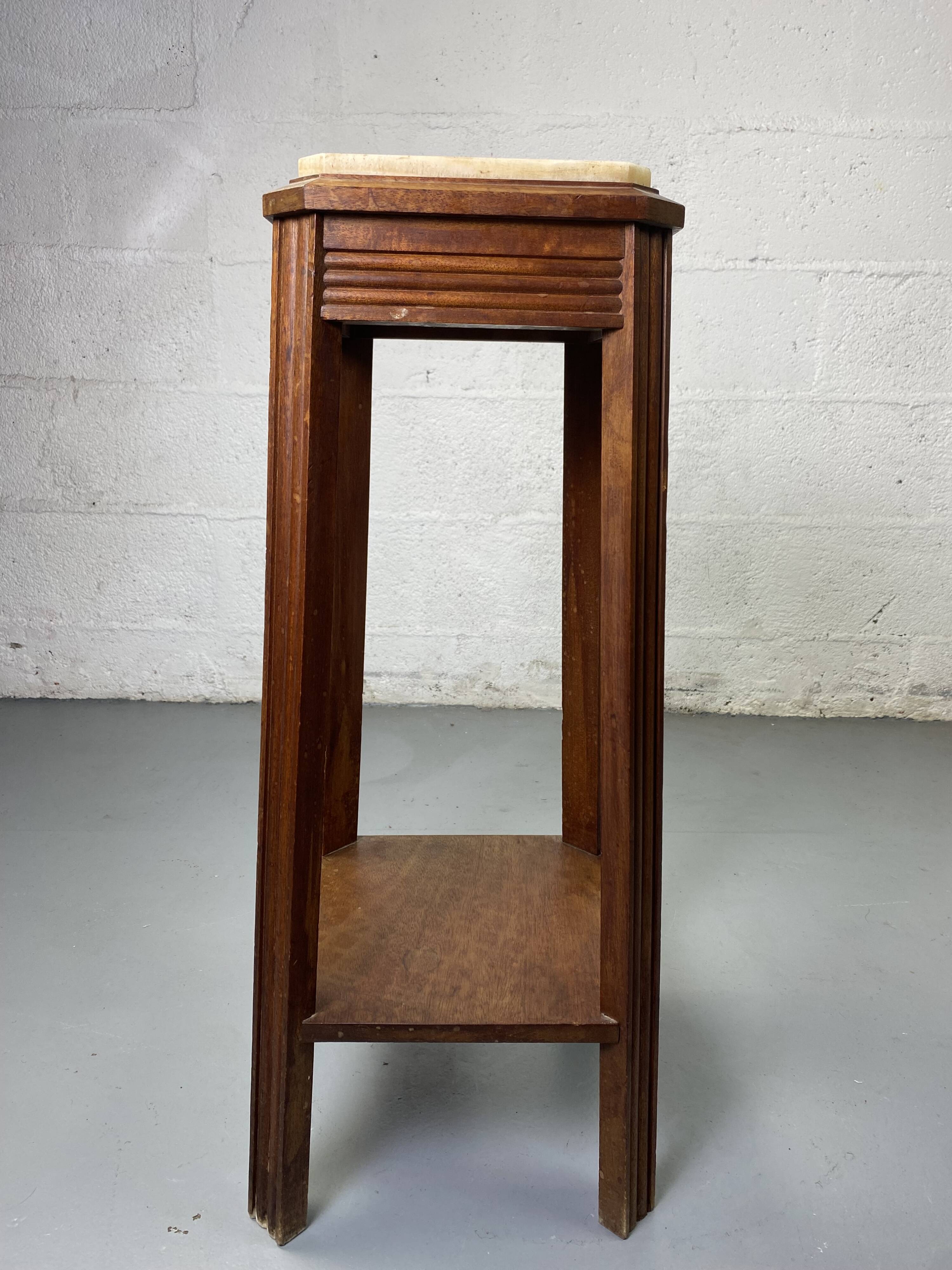 Wooden stool with marble top