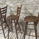 3 vintage wooden bar stools from the 60s/70s with a bistro spirit.