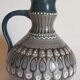 Ceramic handle vase with vintage graphic decoration
