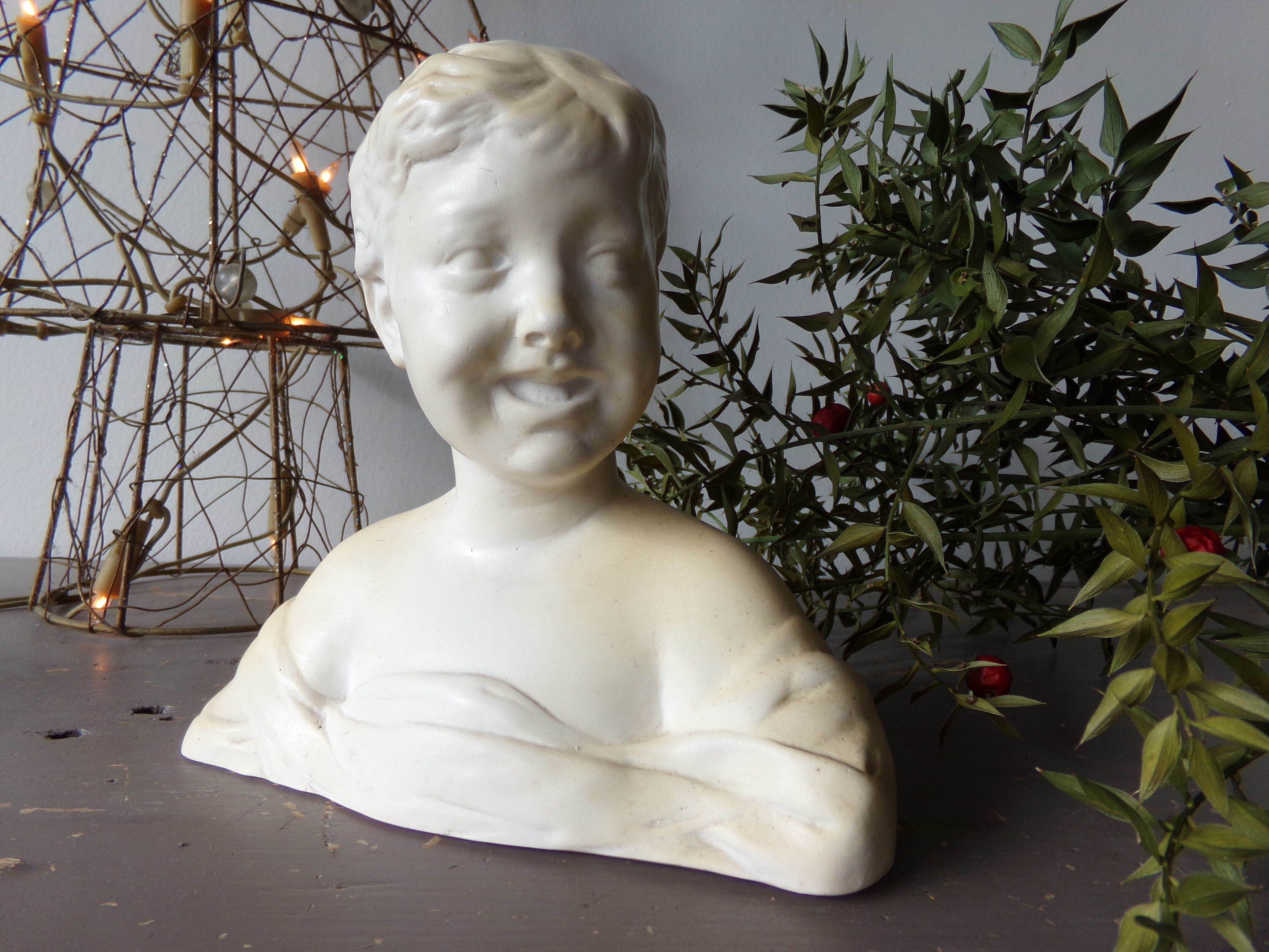 Bust of the laughing child