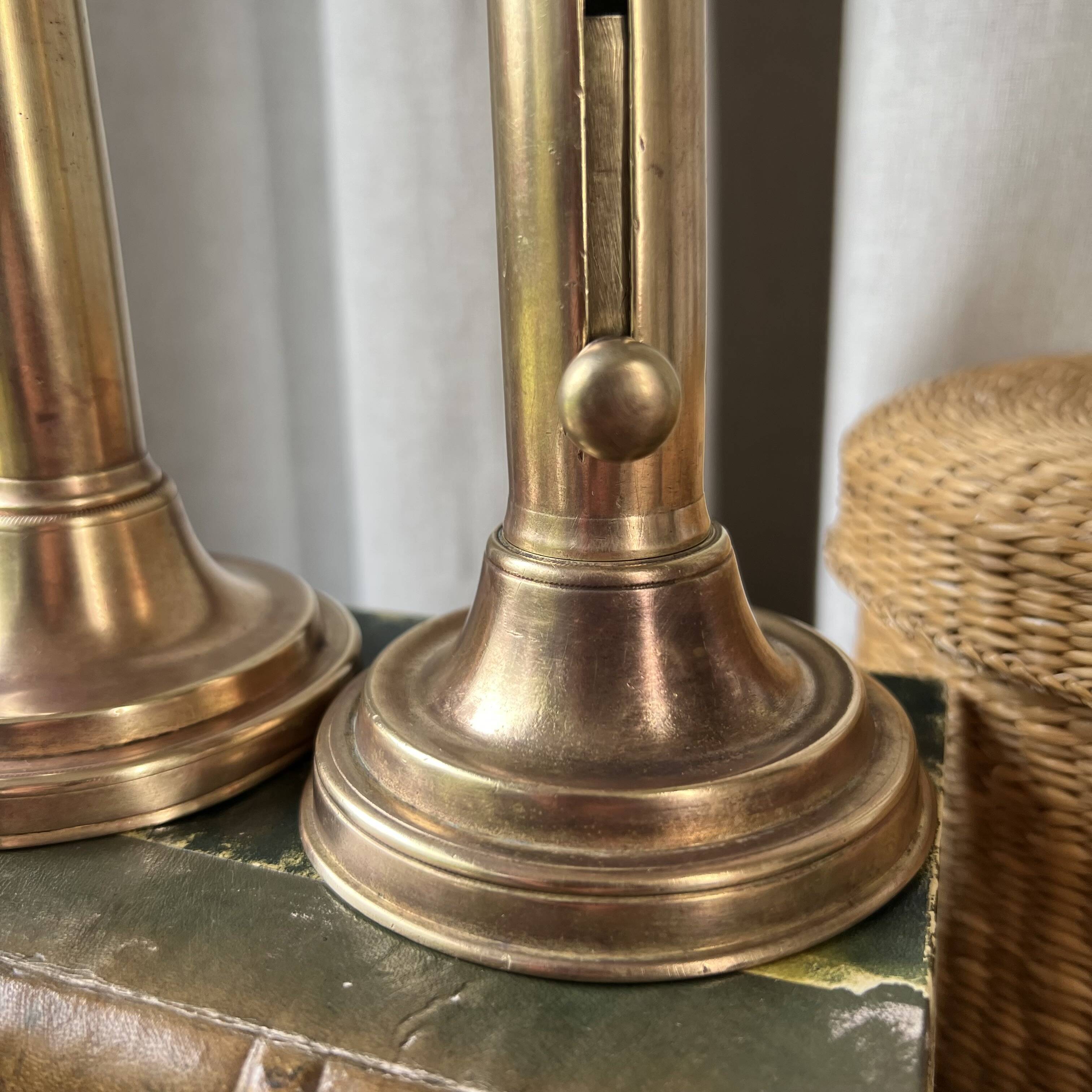 Duo of brass candlesticks
