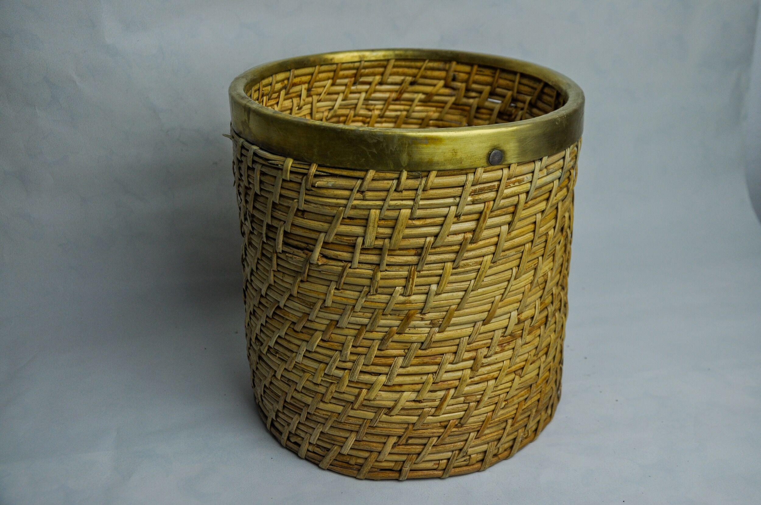 Rattan and brass book basket, Italy, 1970