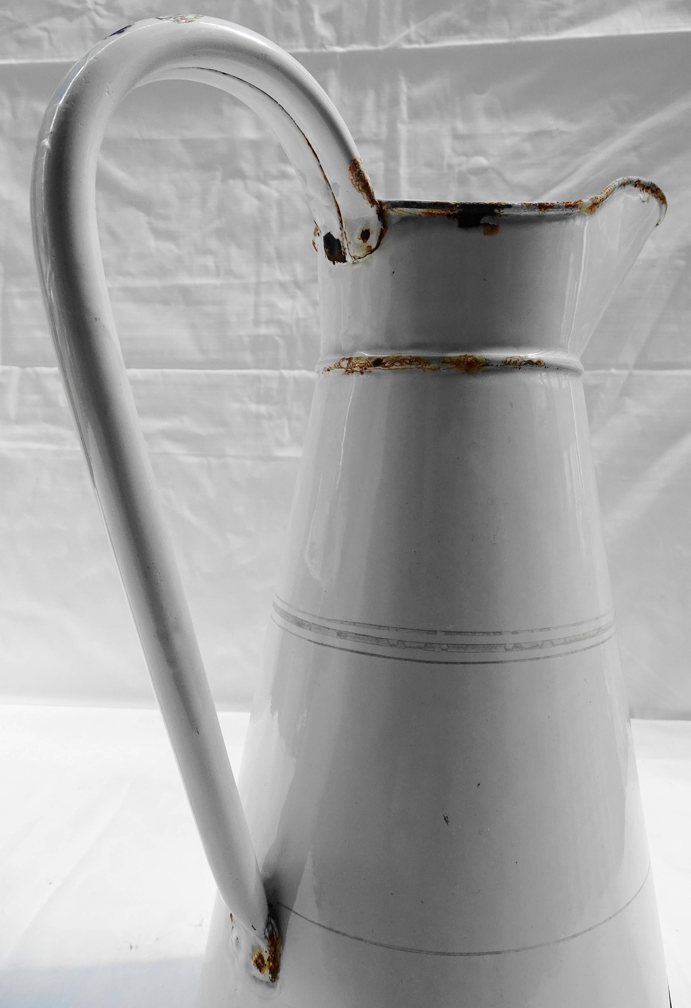 White enamelled iron broc