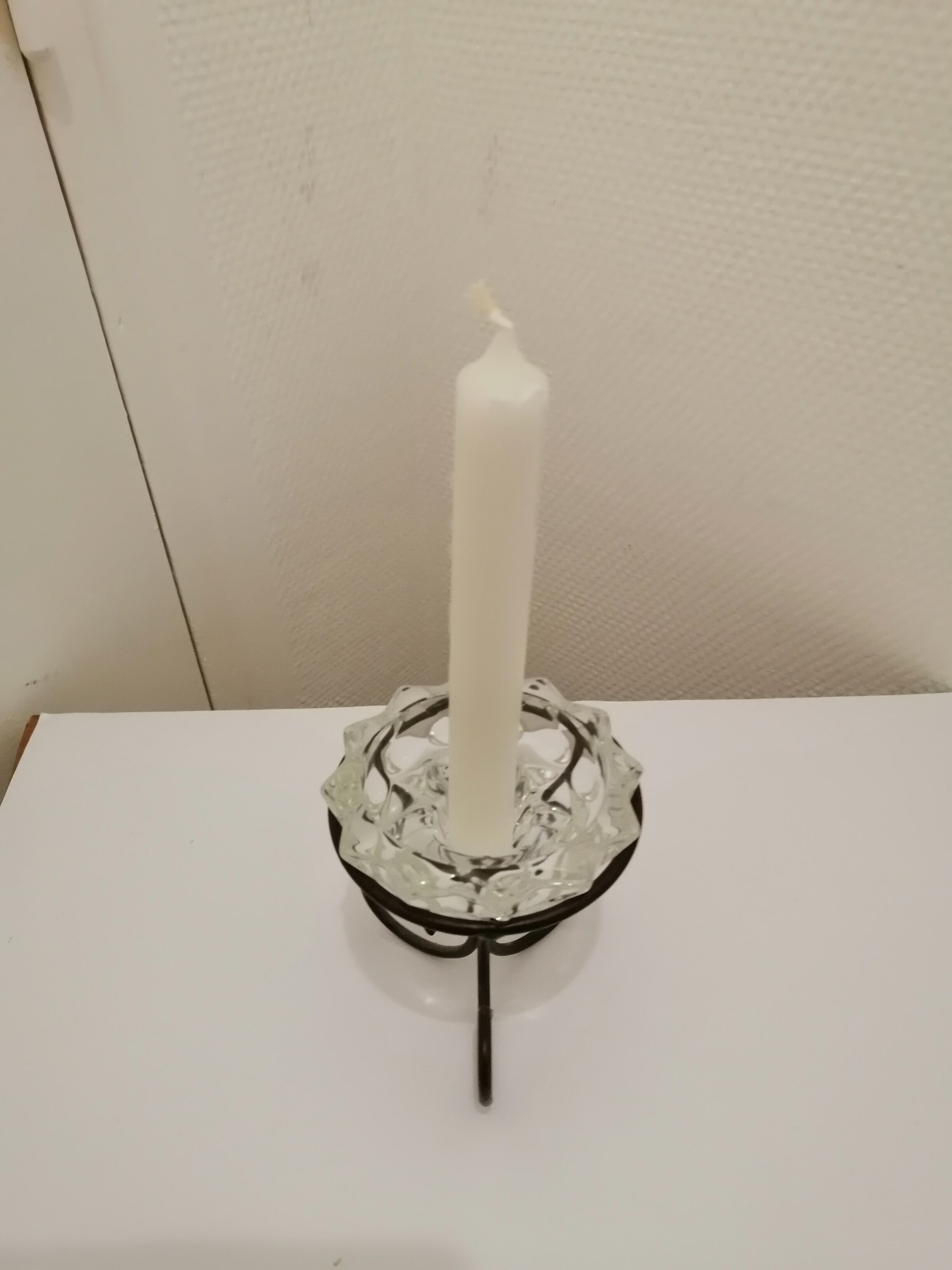 Metal base glass candle holder
