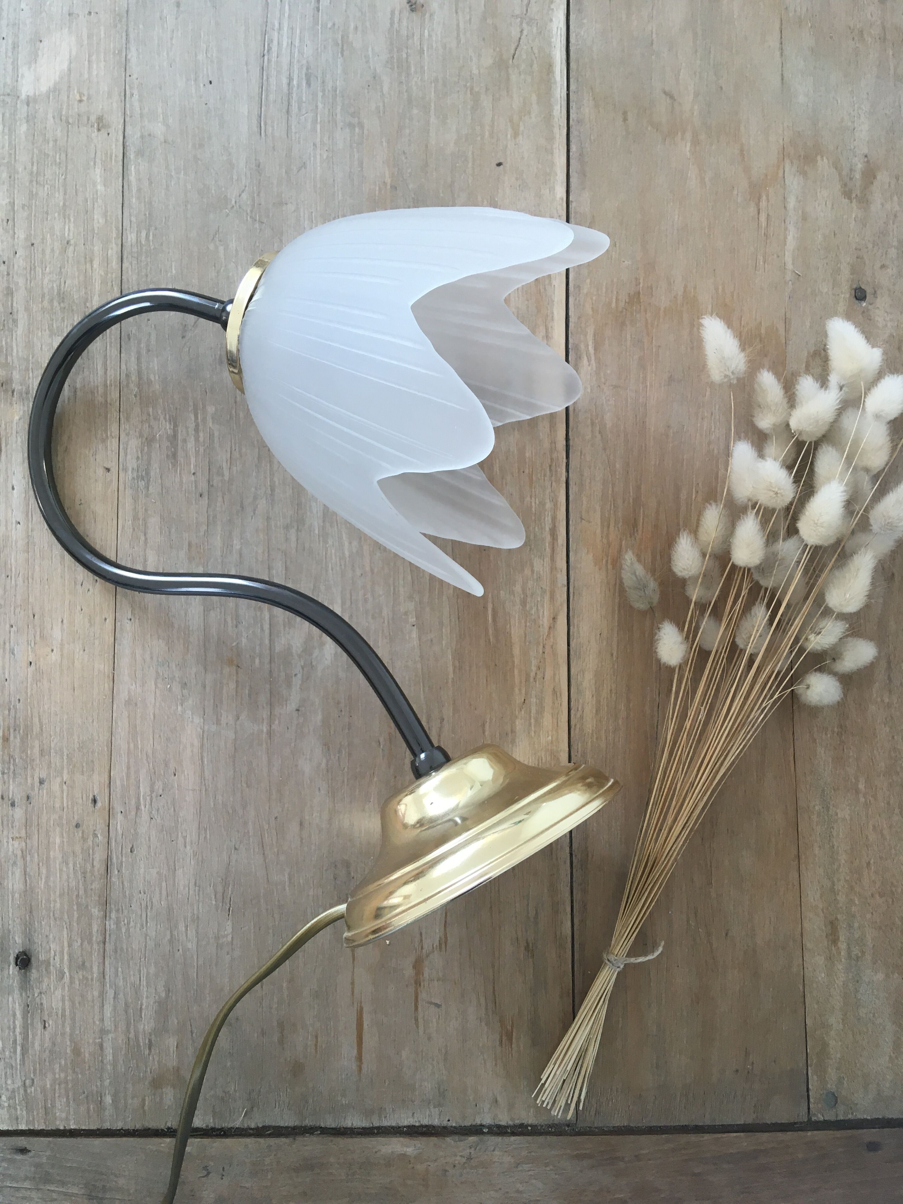 Table lamp with glass globe and brass foot