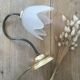 Table lamp with glass globe and brass foot