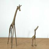 Giraffe and brass bird
