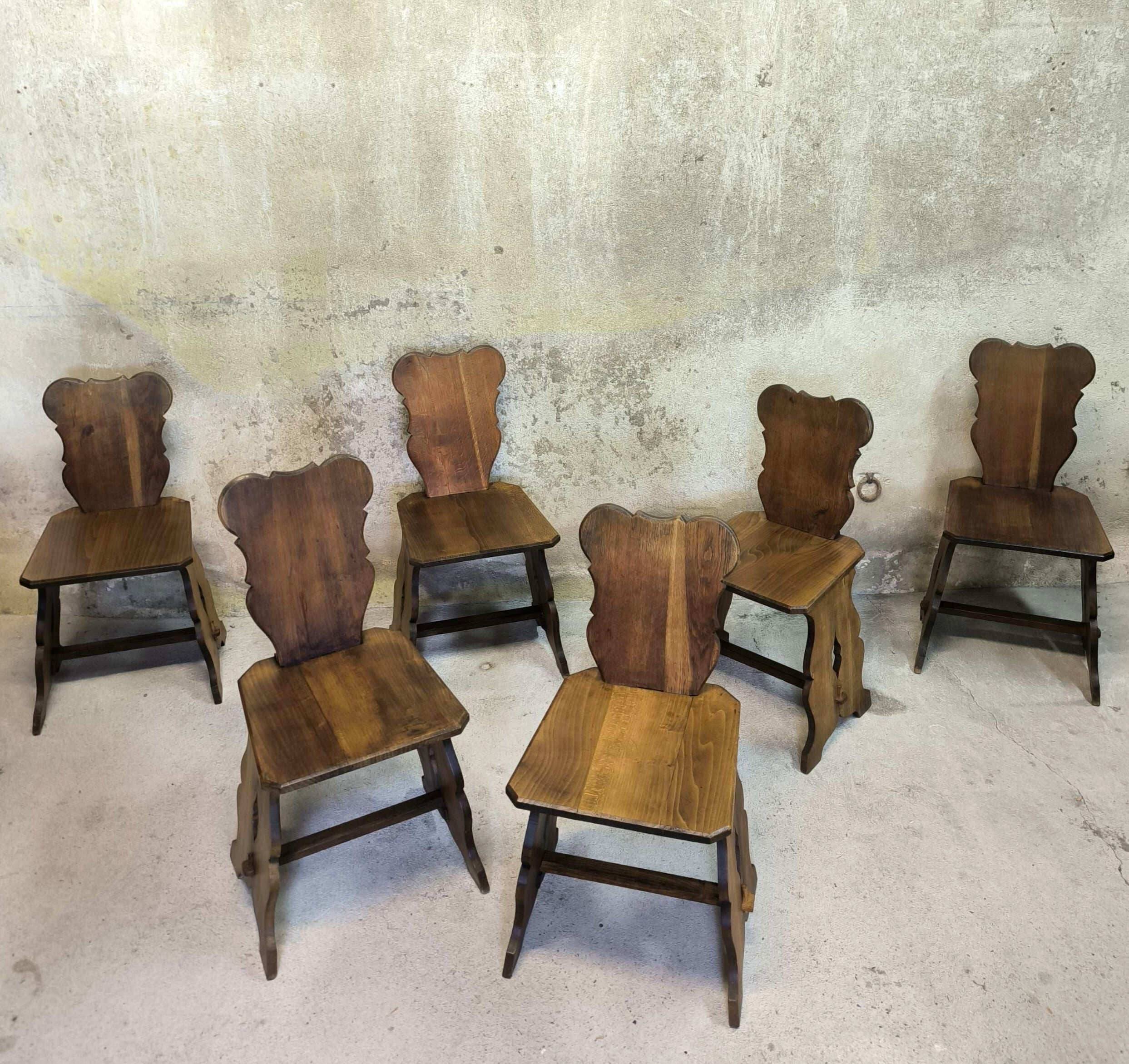 Set of six vintage brutalist wooden chairs.