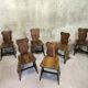 Set of six vintage brutalist wooden chairs.