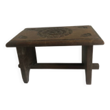 Old small hand-carved bench