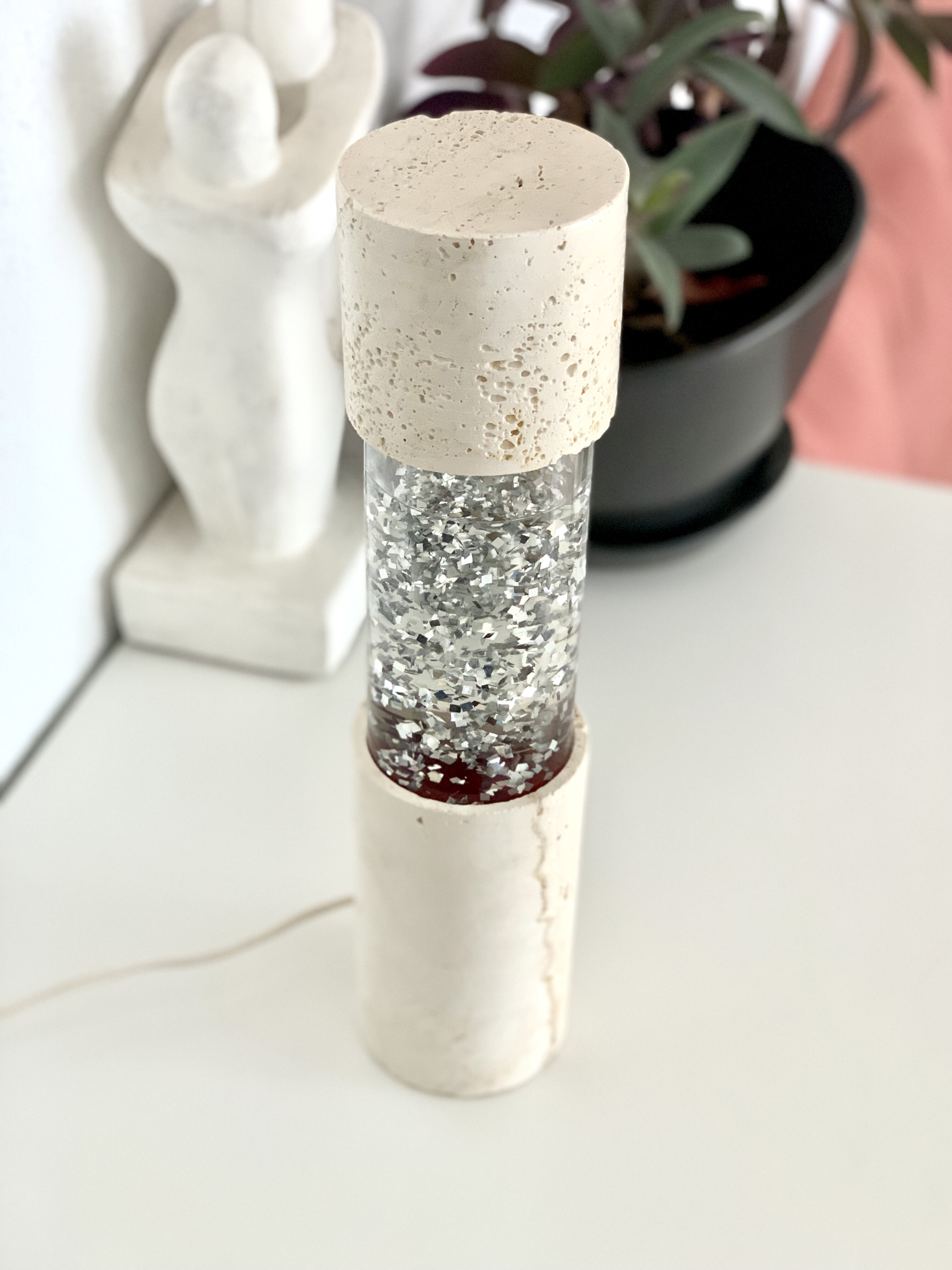Vintage glitter lamp and travertine from the 70s.