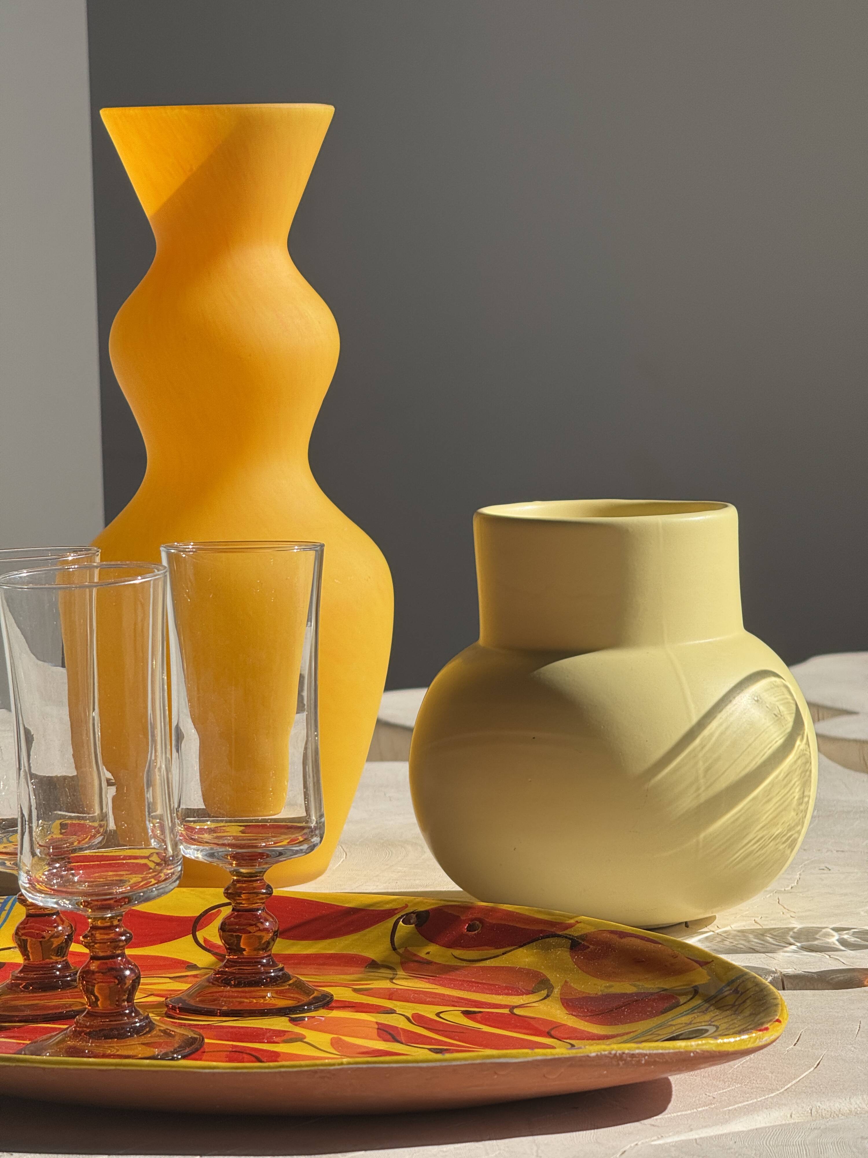 Small light yellow ball vase