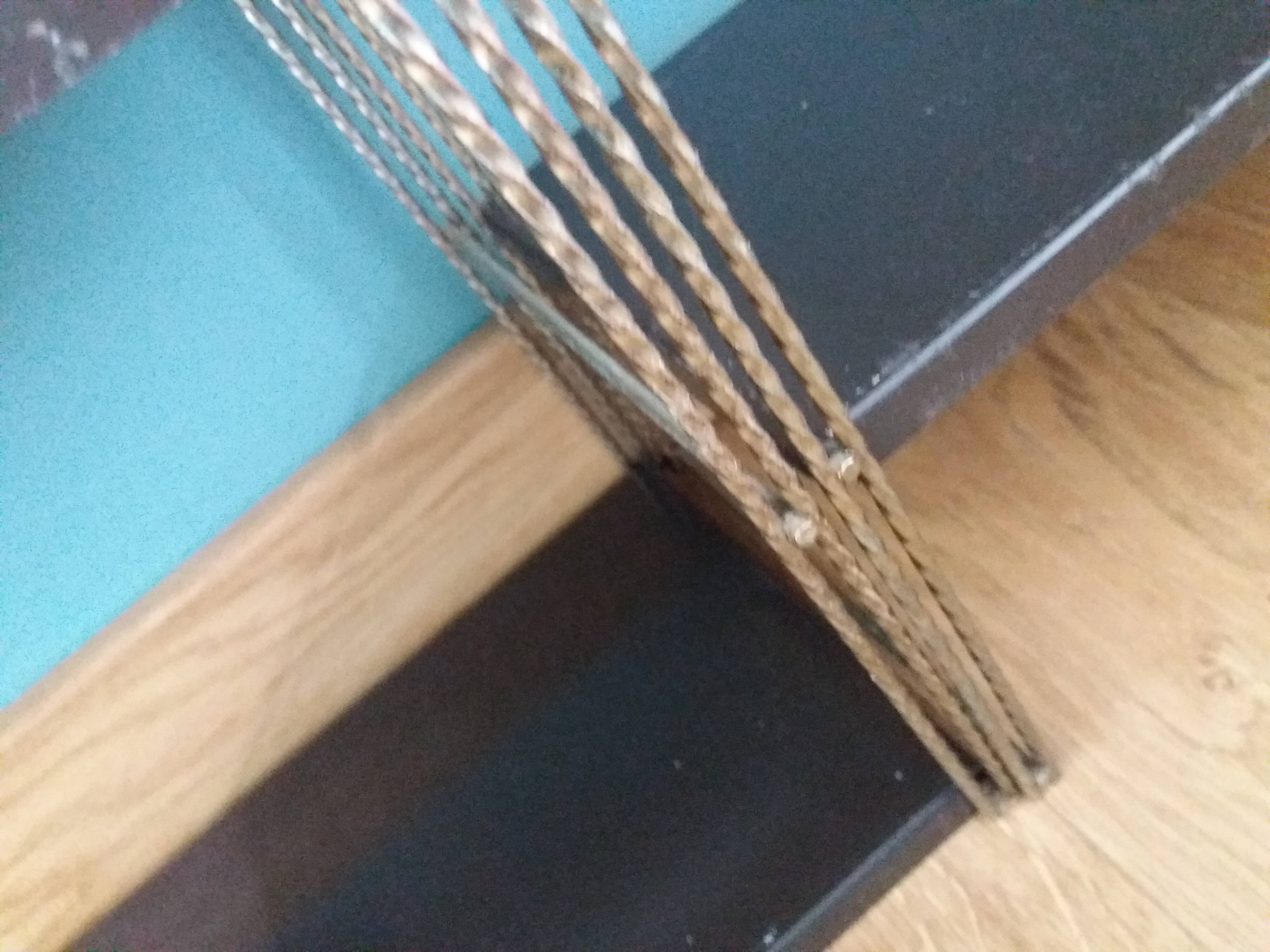 String twisted metal wall shelves