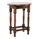Antique oval English oak side table from the early 20th century